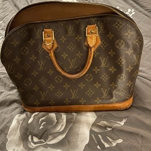 Louie Vuitton Alma Bag